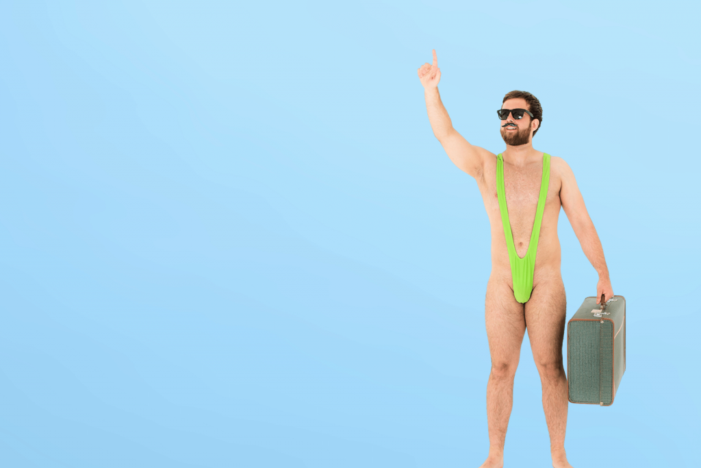 A man who's been subjected to the mankini prank standing in a green mankini